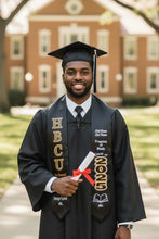 Load image into Gallery viewer, HBCU Graduation Stole → "Black male graduate wearing a glitter HBCU graduation stole in black and gold"